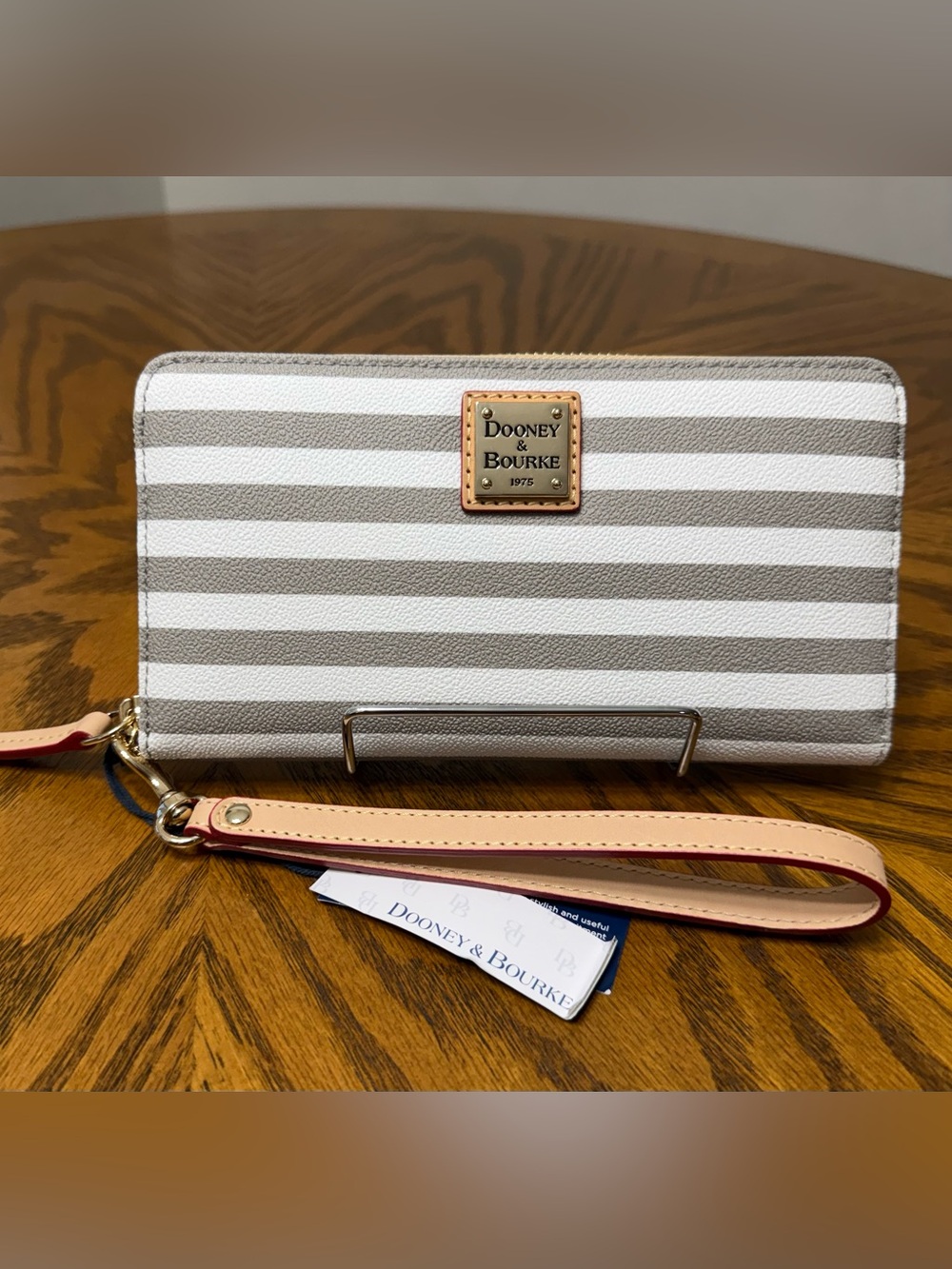 Dooney & Bourke Taupe and White Striped Wallet Wristlet with Tan Leather Strap